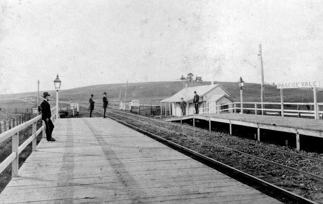 Pascoe Vale railway station looking north across the Gaffney street railway gates 