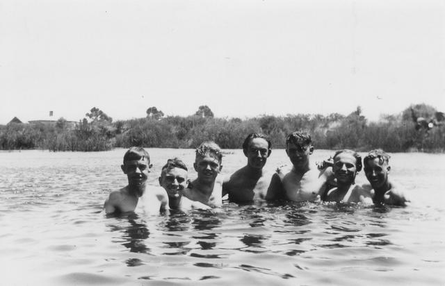 Moulding apprentices enjoying a dip in Quarry pool at Steel Company of Australia Mill