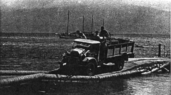 Truck believed to be landing on a Pacific Island during World War 2.