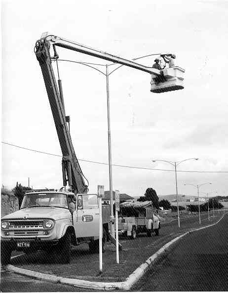 [Fixing the street lights]