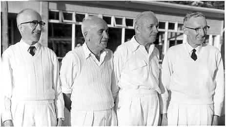 [Four lawn bowlers]