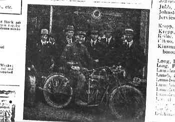 [Man on motorcycle]