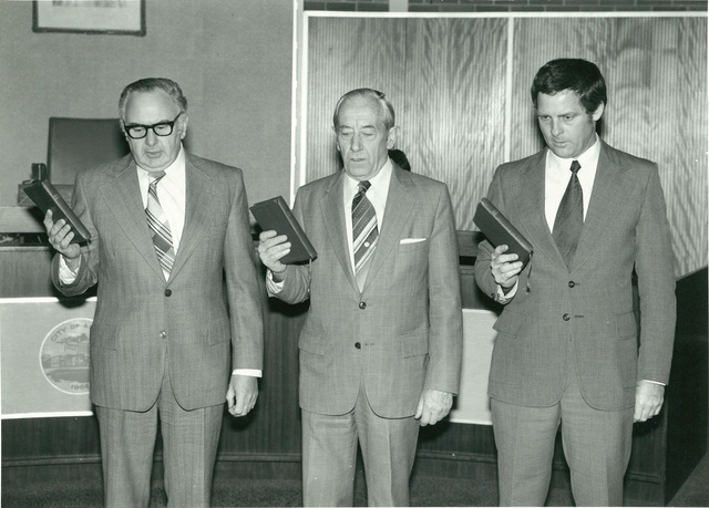 Councillors being sworn in- 3 men