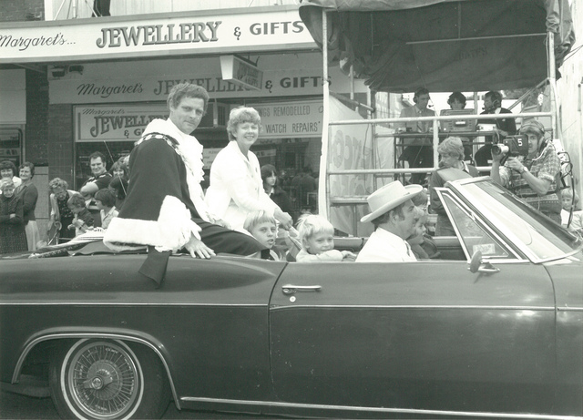 City of Altona Mayor D.N. Duane and wife parading in a car down Pier Street