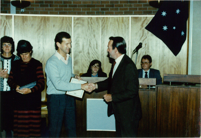 Altona City Councillor W.H.  Sommers presenting a certificate