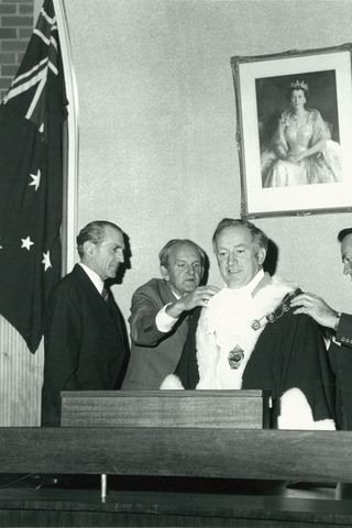 City of Altona Councillor H.D. Graham being dressed