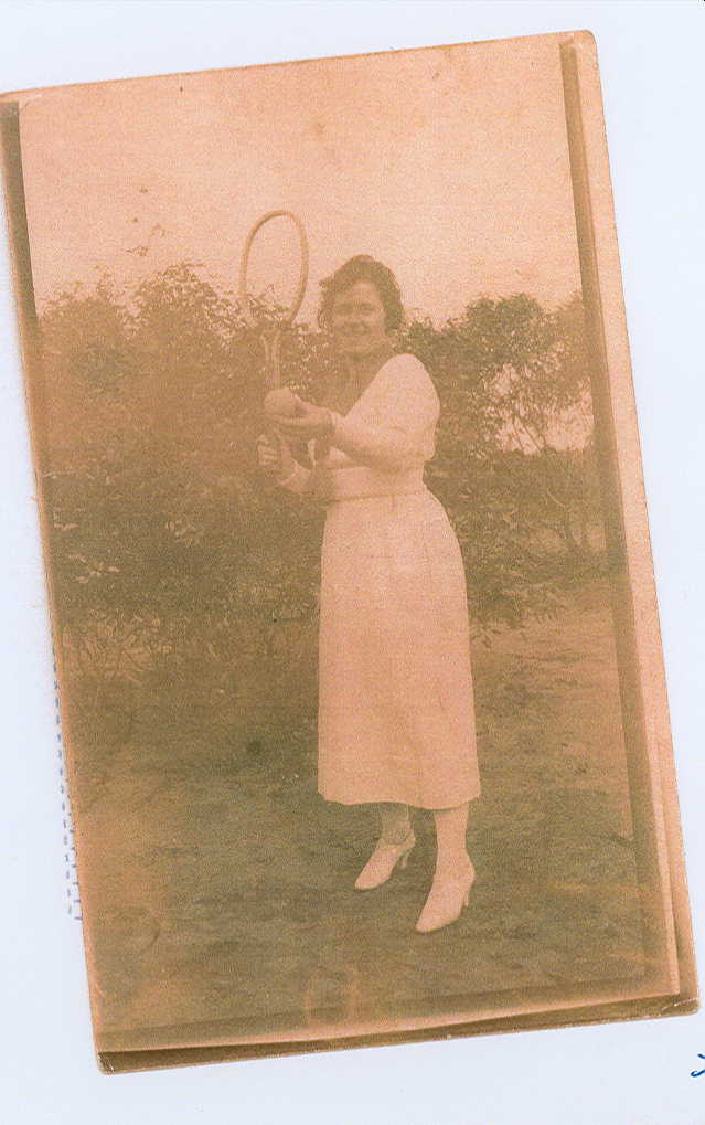 [Mrs Cottee playing tennis]