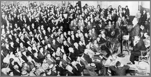Prime Minister Joseph Lyons addressing a meeting in Grand Picture Theatre, Paisley Street, Footscray.