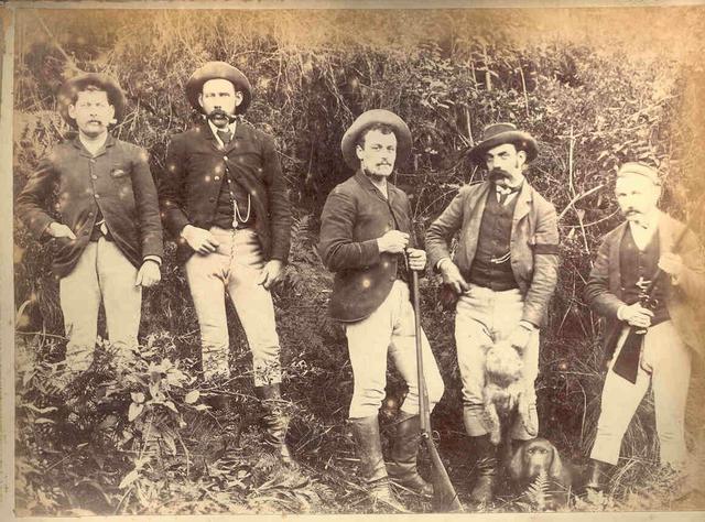 Group with dog and guns