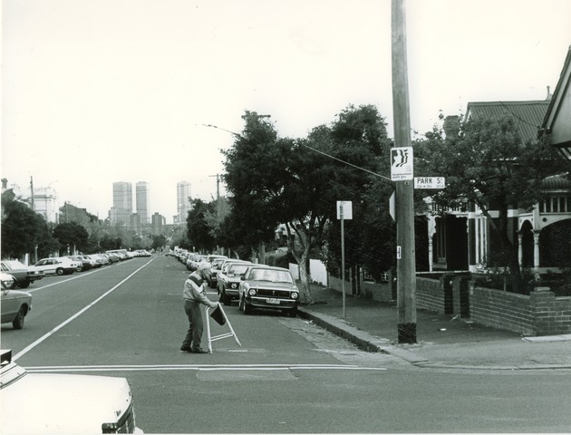 Elderly man crosses Station Street North Carlton