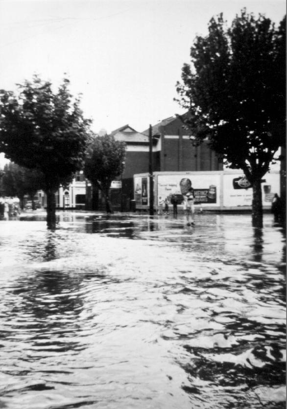 Floods at the intersection of Hoddle and Gipps Street
