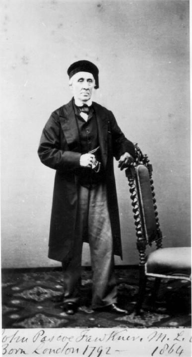 J. P. Fawkner standing
