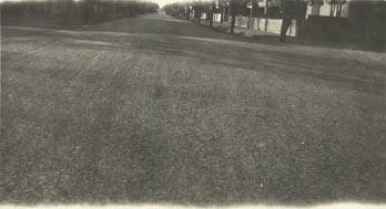 Premixed asphaltic macadam surface after some traffic, Rae Street , North Fitzroy. 